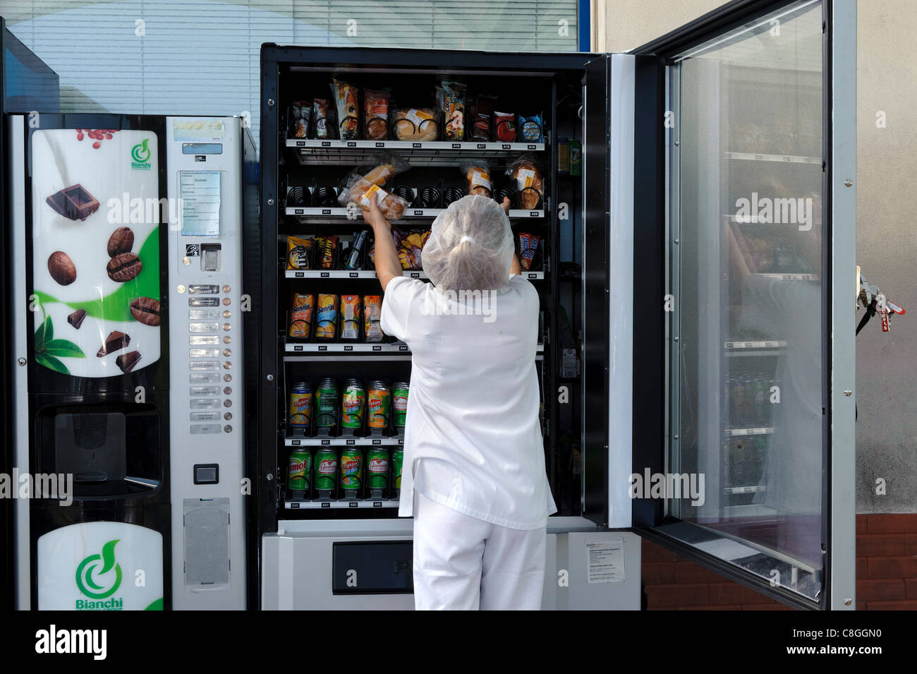 Woman restocking vending machine Stock Photo, Royalty Free Image 39702348 Alamy