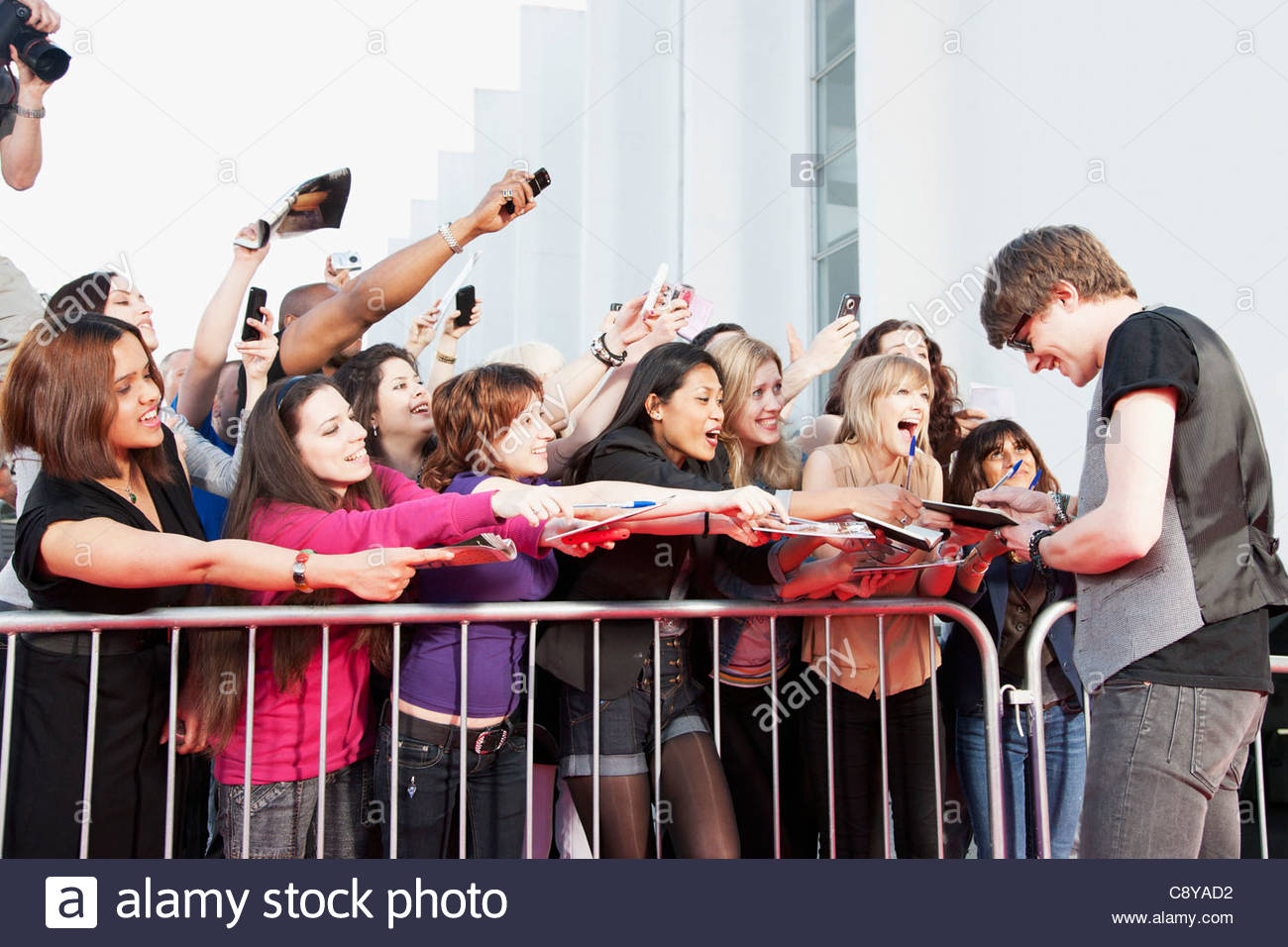 Celebrity signing autographs for fans Stock Photo 39938894 Alamy