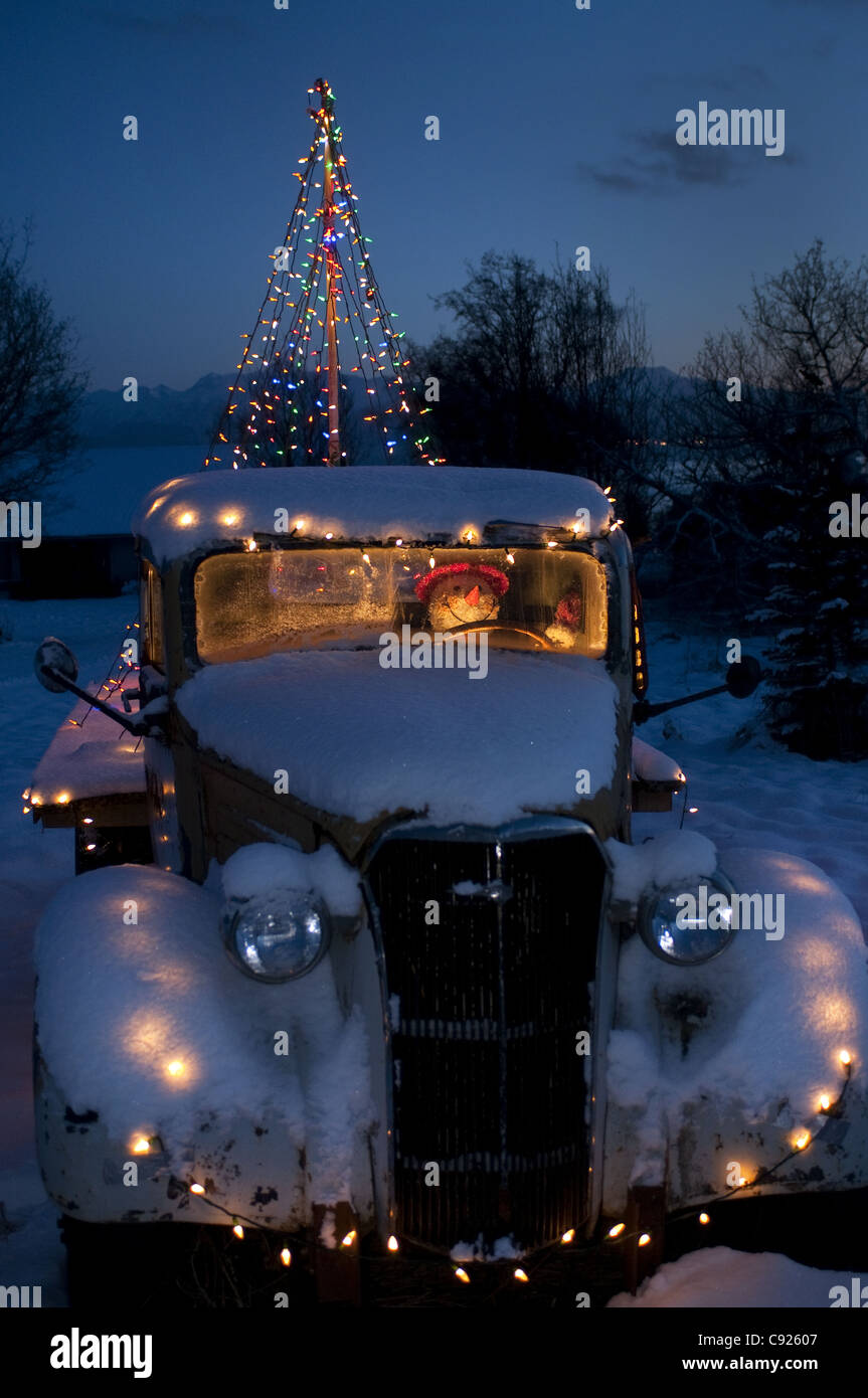 chevy flatbed truck with christmas lights and snowman in chevy flatbed truck with christmas lights and snowman in