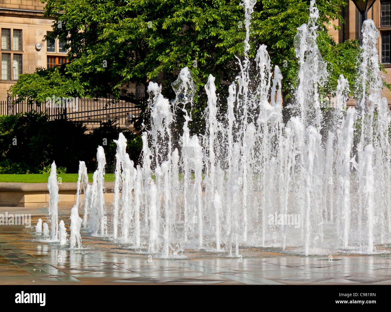Water jets in a large fountain in Sheffield Peace Gardens in Stock