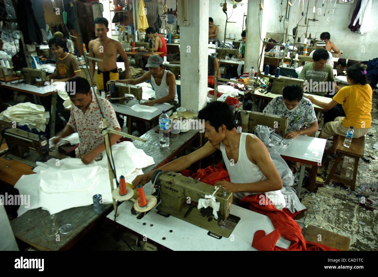 Workers sew clothes at Garment home industry factory in Jakarta Stock