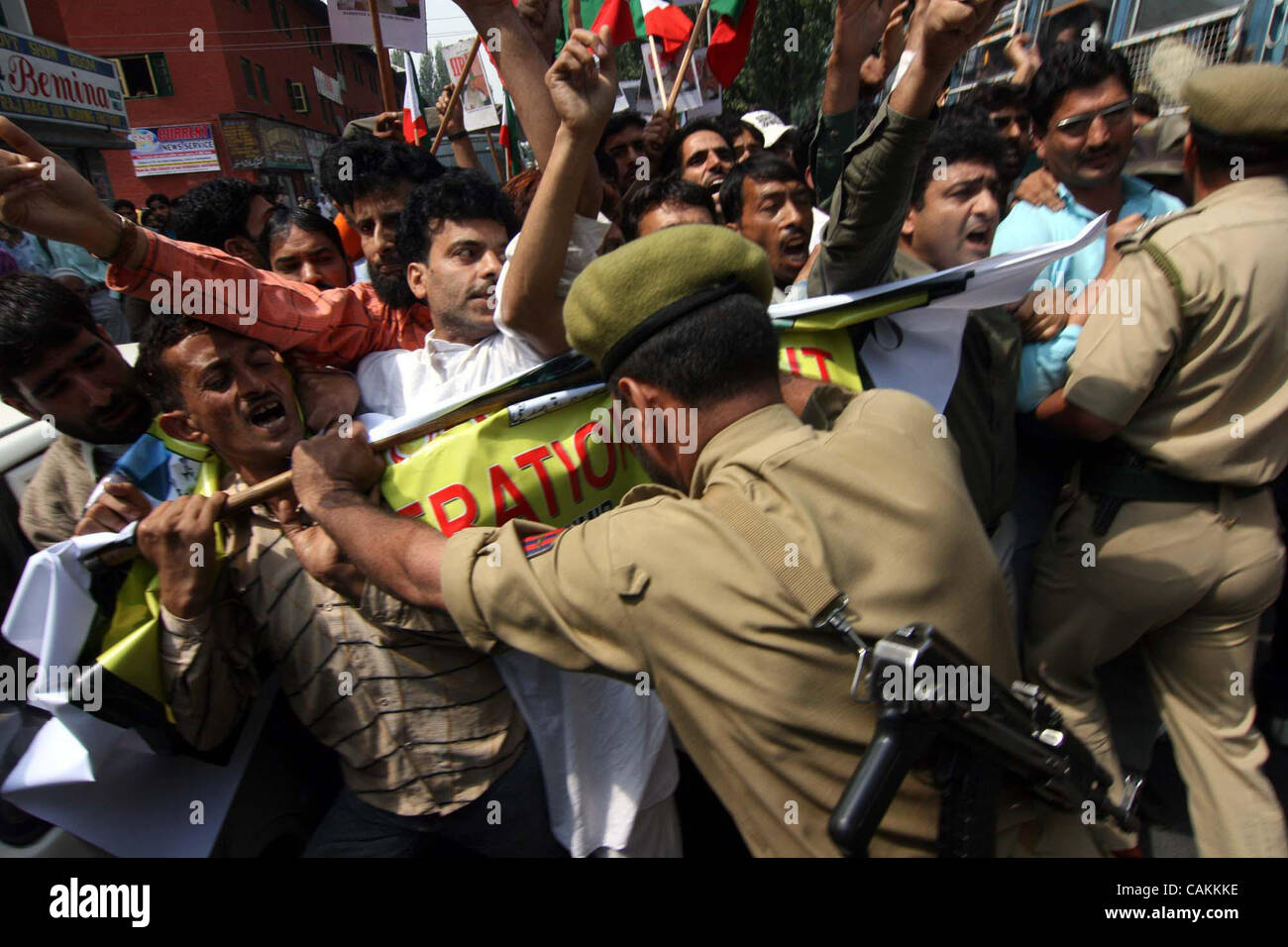 Indian Policemen Trying To Stop Activists Of Jammu Kashmir Liberation