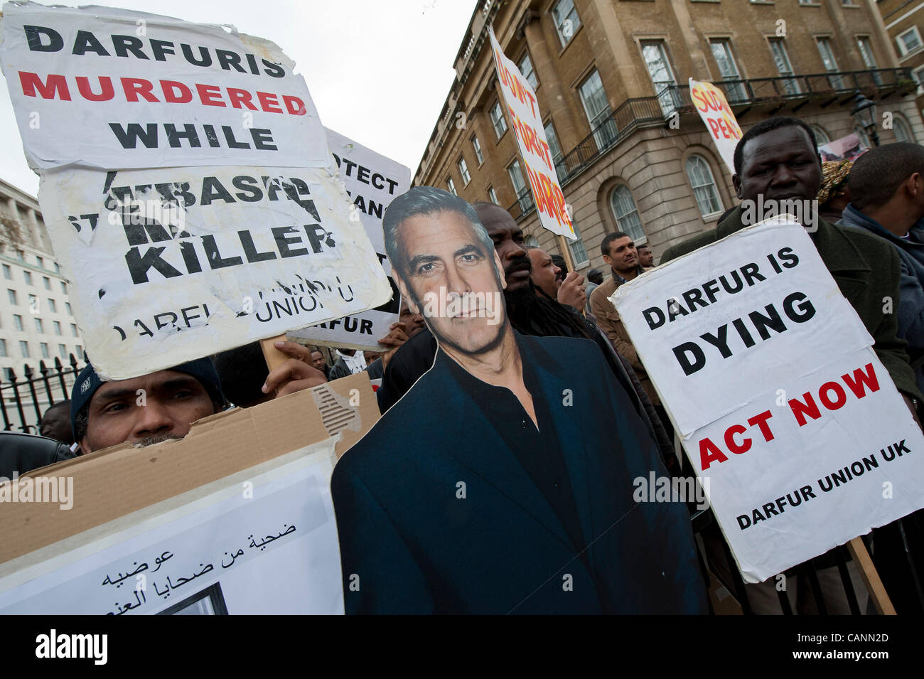 A Cardboard George Clooney At A Protest On Behalf Of The Nuba People To