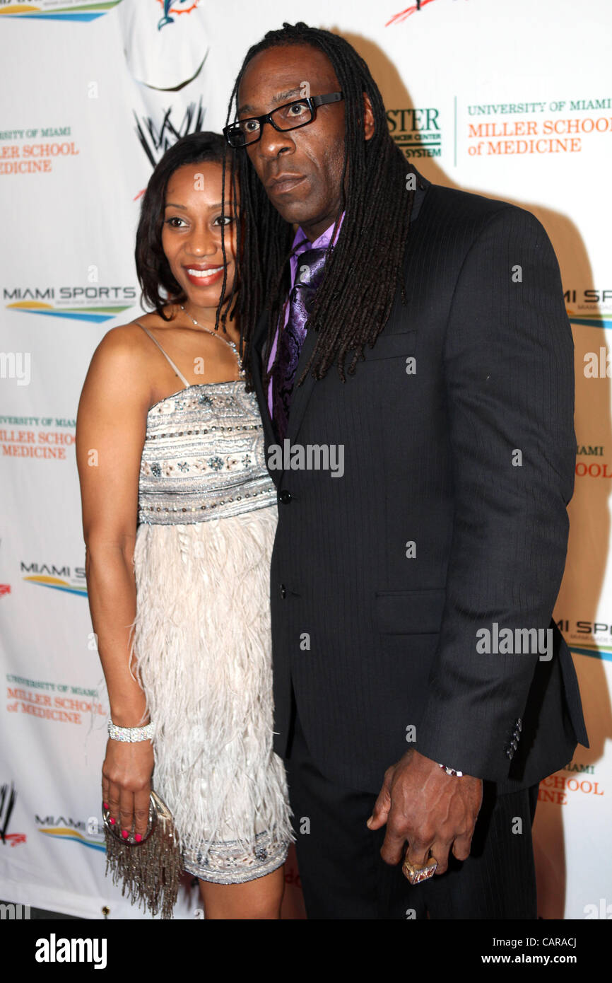 Booker T and wife Sharmell Huffman pose for media on the red carpet
