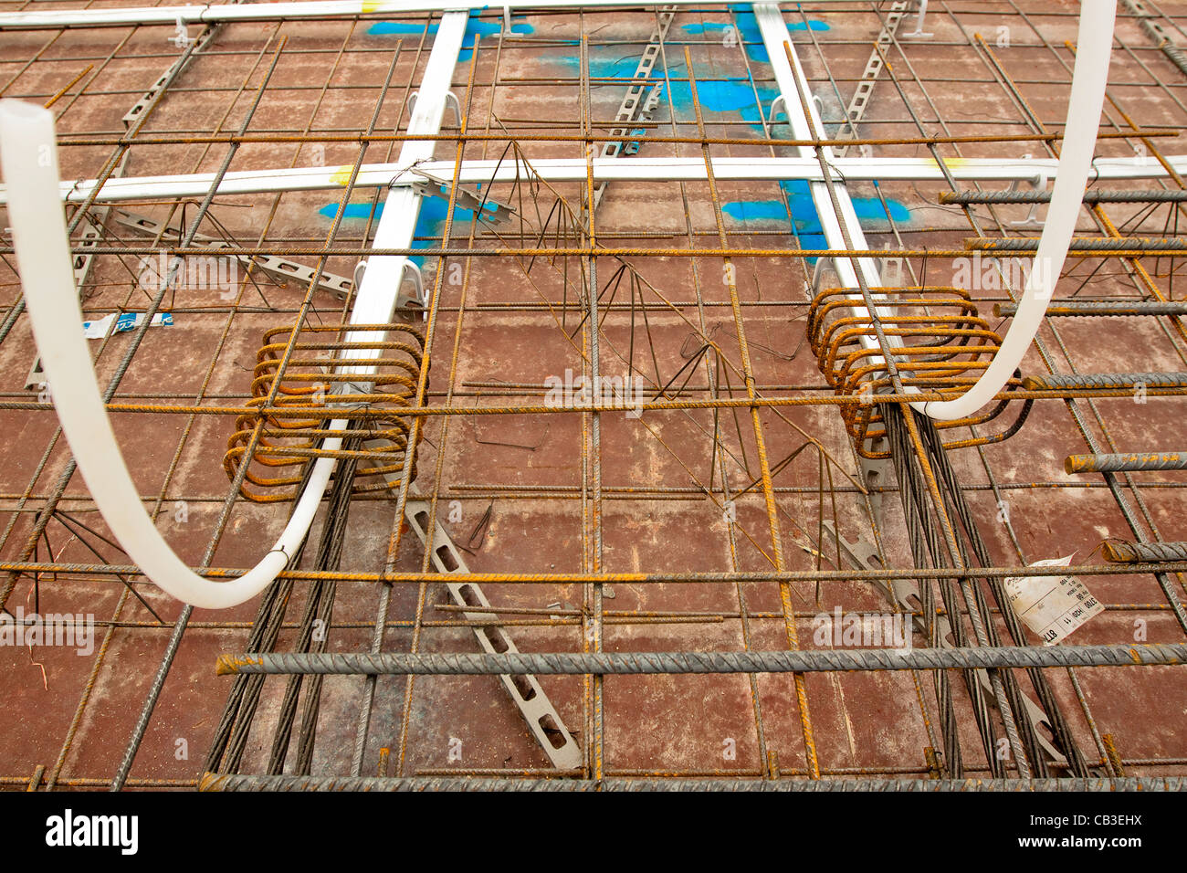 Posttensioning steel cables in concrete floor formwork Stock Photo