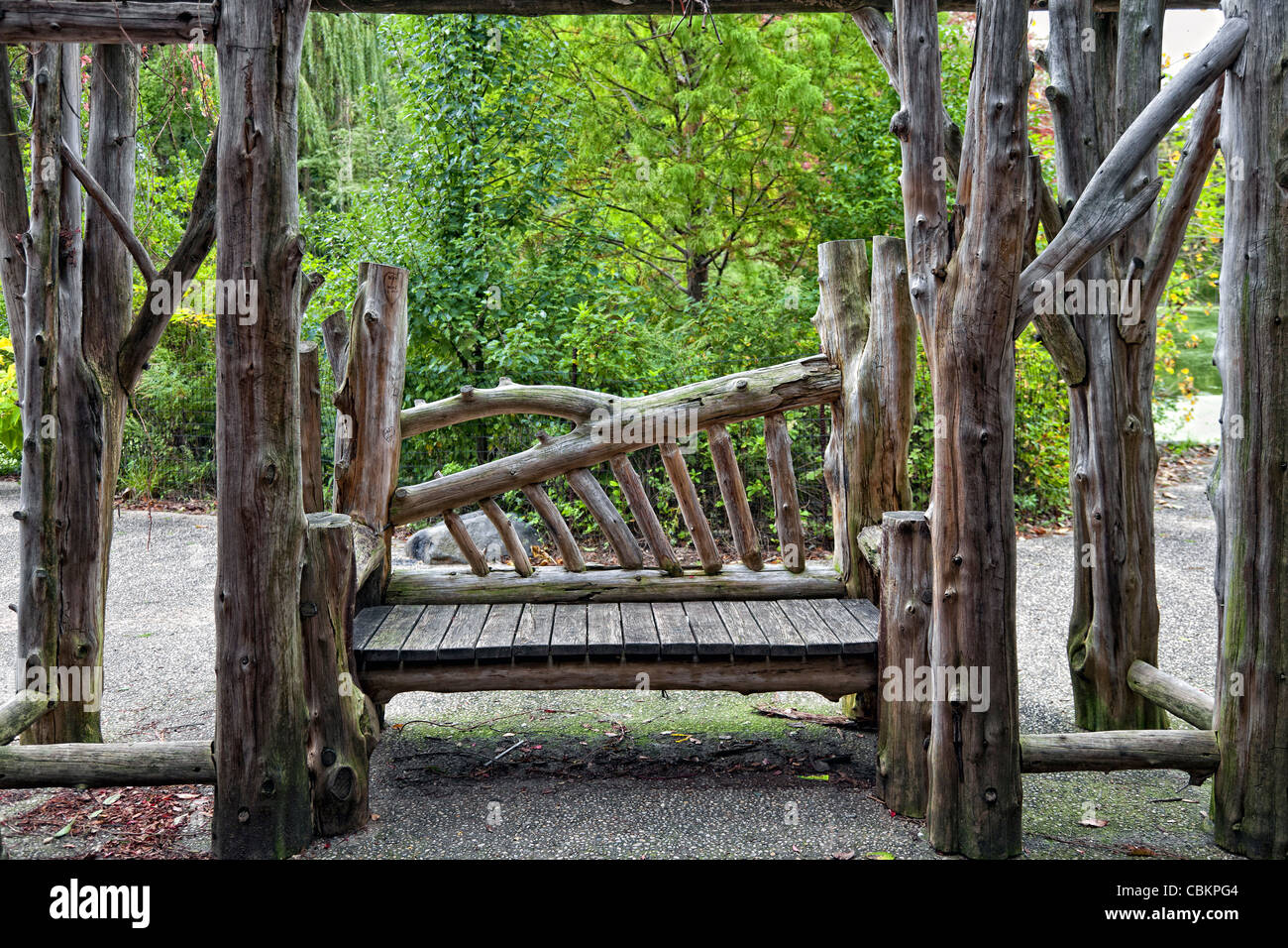 Wooden Bench In Prospect Park Brooklyn NY Green Background Stock