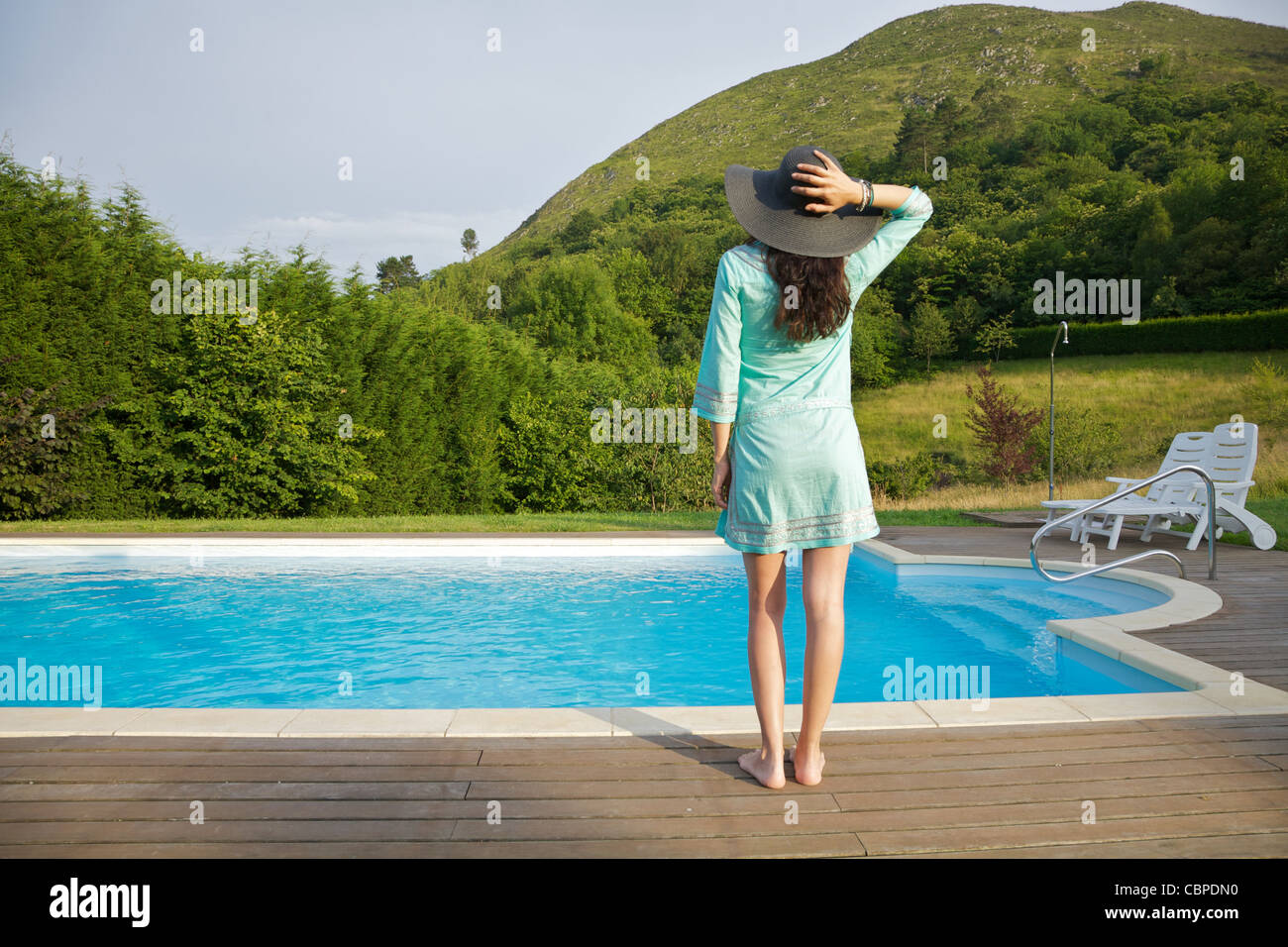 Woman Barefoot At Swimming Pool Border In Asturias Spain Stock