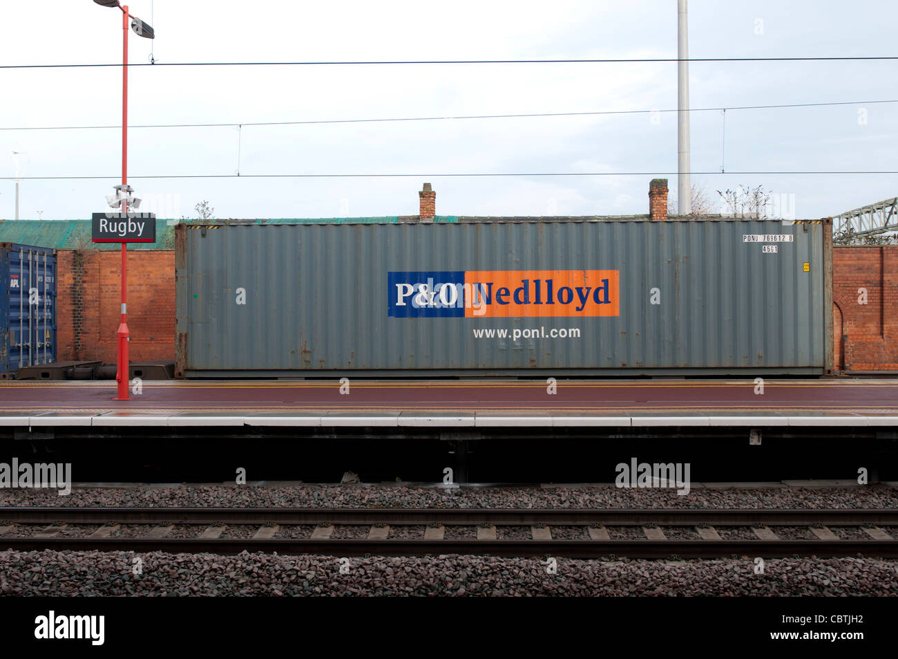 P&O Nedlloyd shipping container passing through Rugby srailway Stock