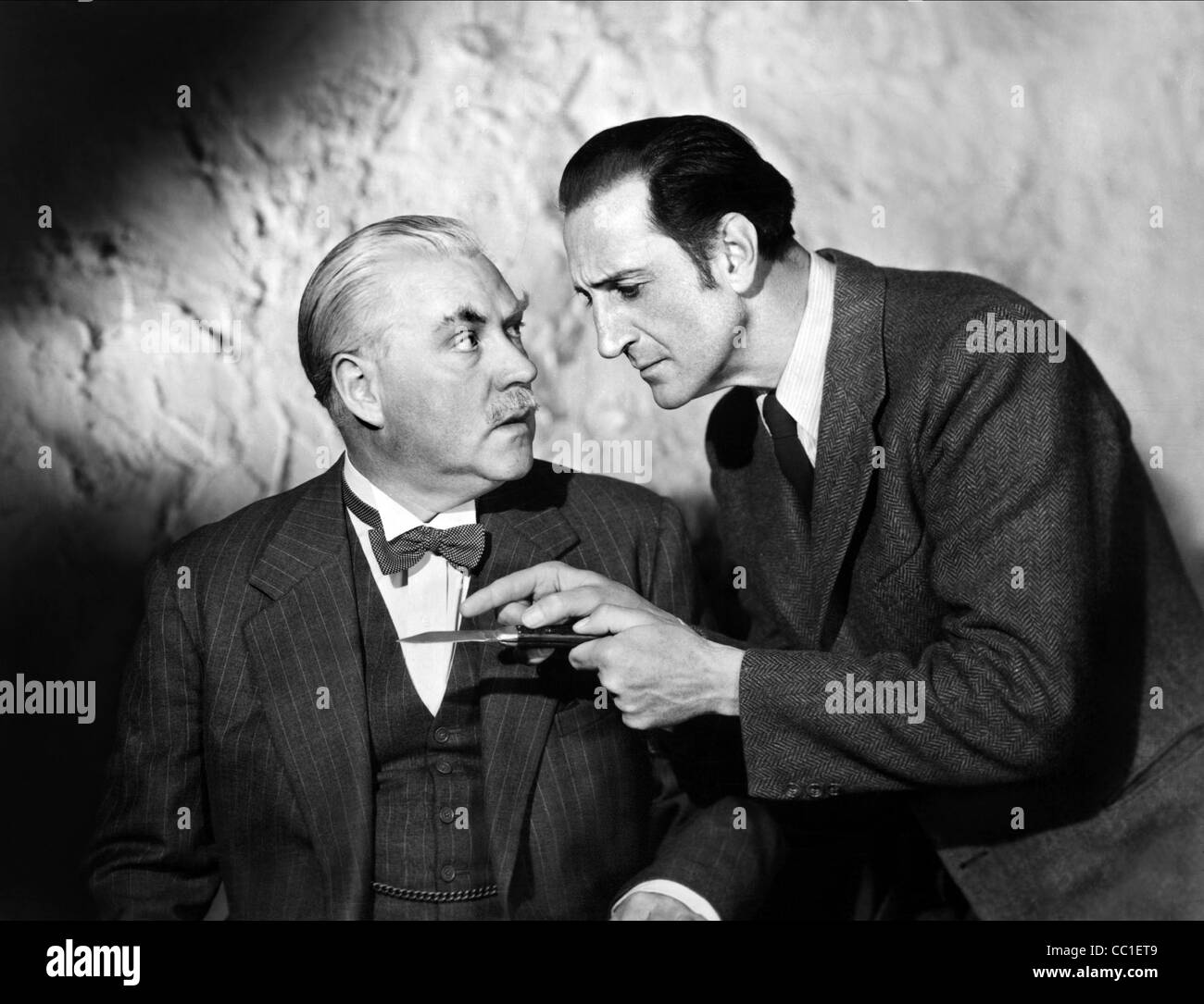 NIGEL BRUCE & BASIL RATHBONE SHERLOCK HOLMES; THE SCARLET CLAW (1944 Stock Photo, Royalty Free