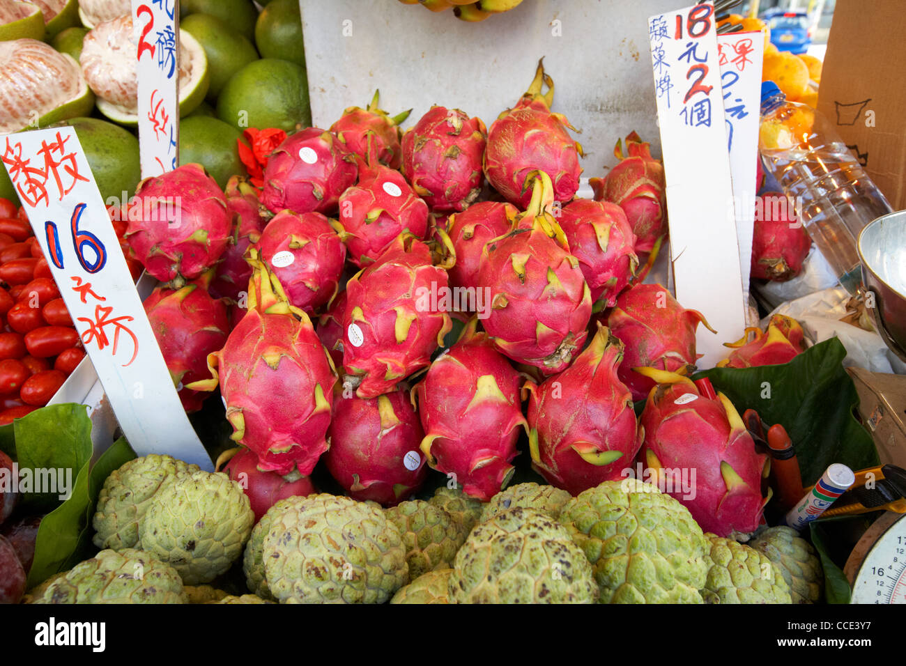 pitaya dragon fruits on a fresh asian fruit stall in aberdeen hong