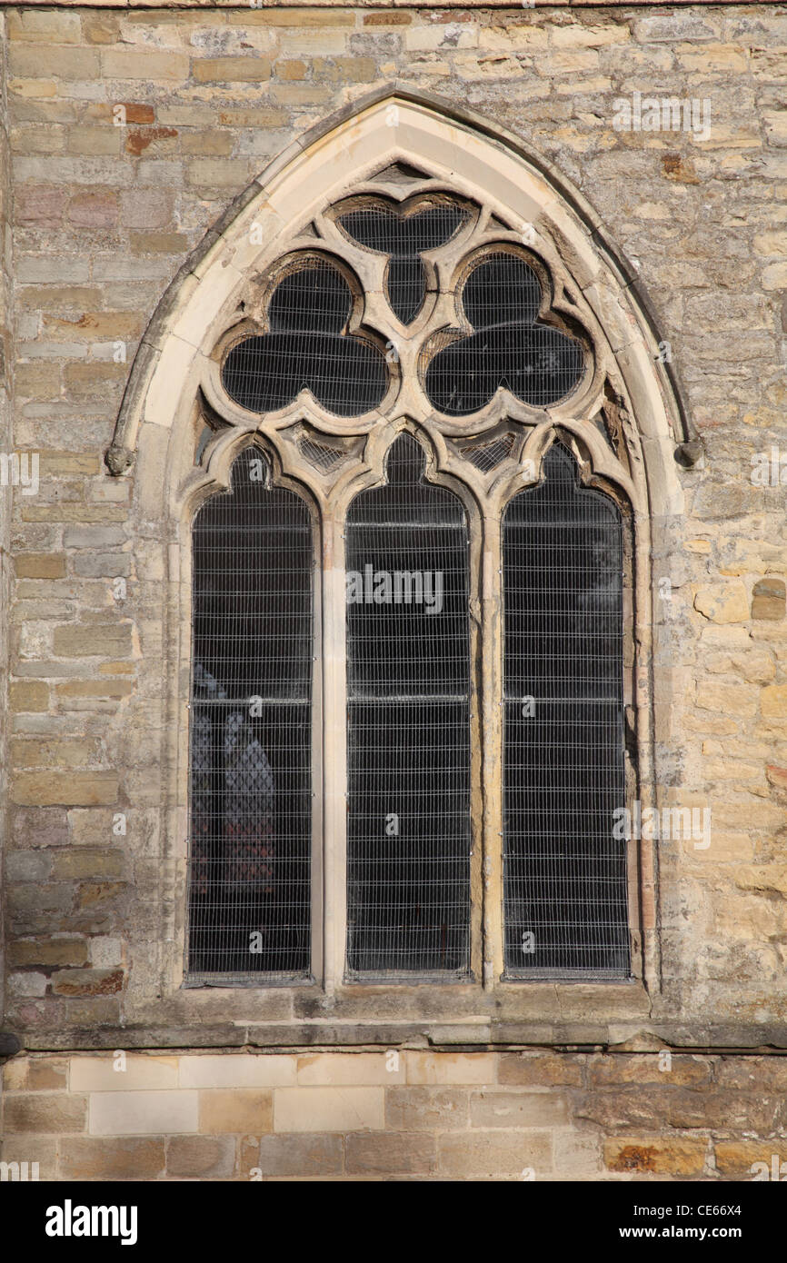 Reticulated tracery in a 14th century window (restored), St Peter's