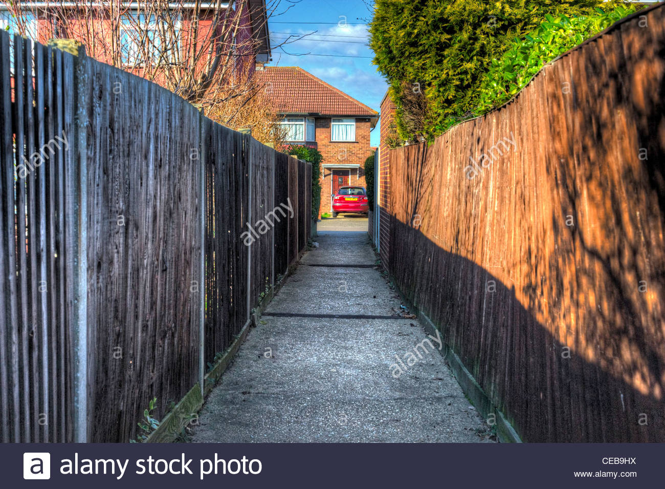 Alleyway Between Houses In Residential Suburb Stock Photo, Royalty Free