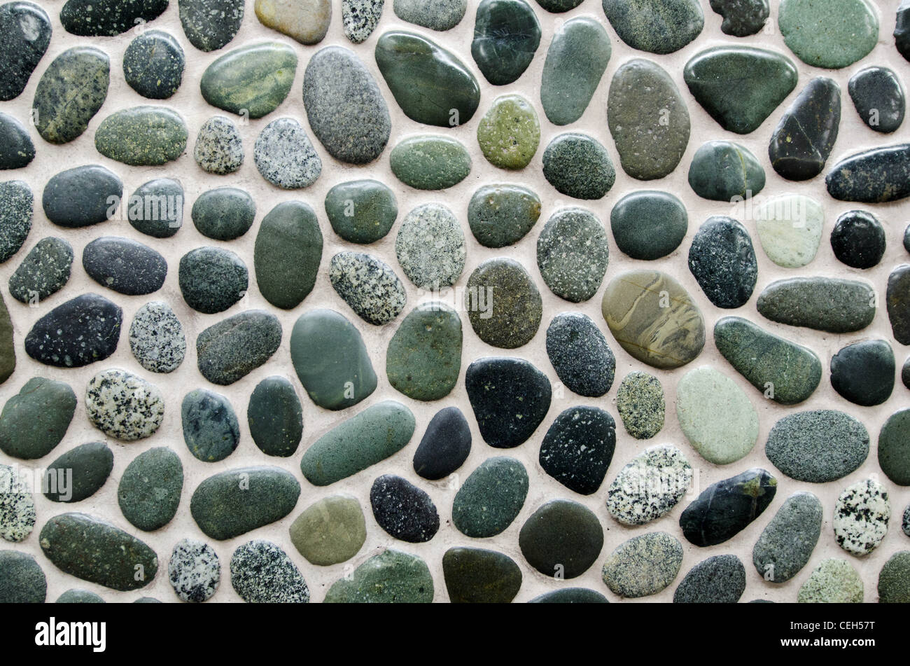 Green river stones on a wall Stock Photo, Royalty Free Image 43403244