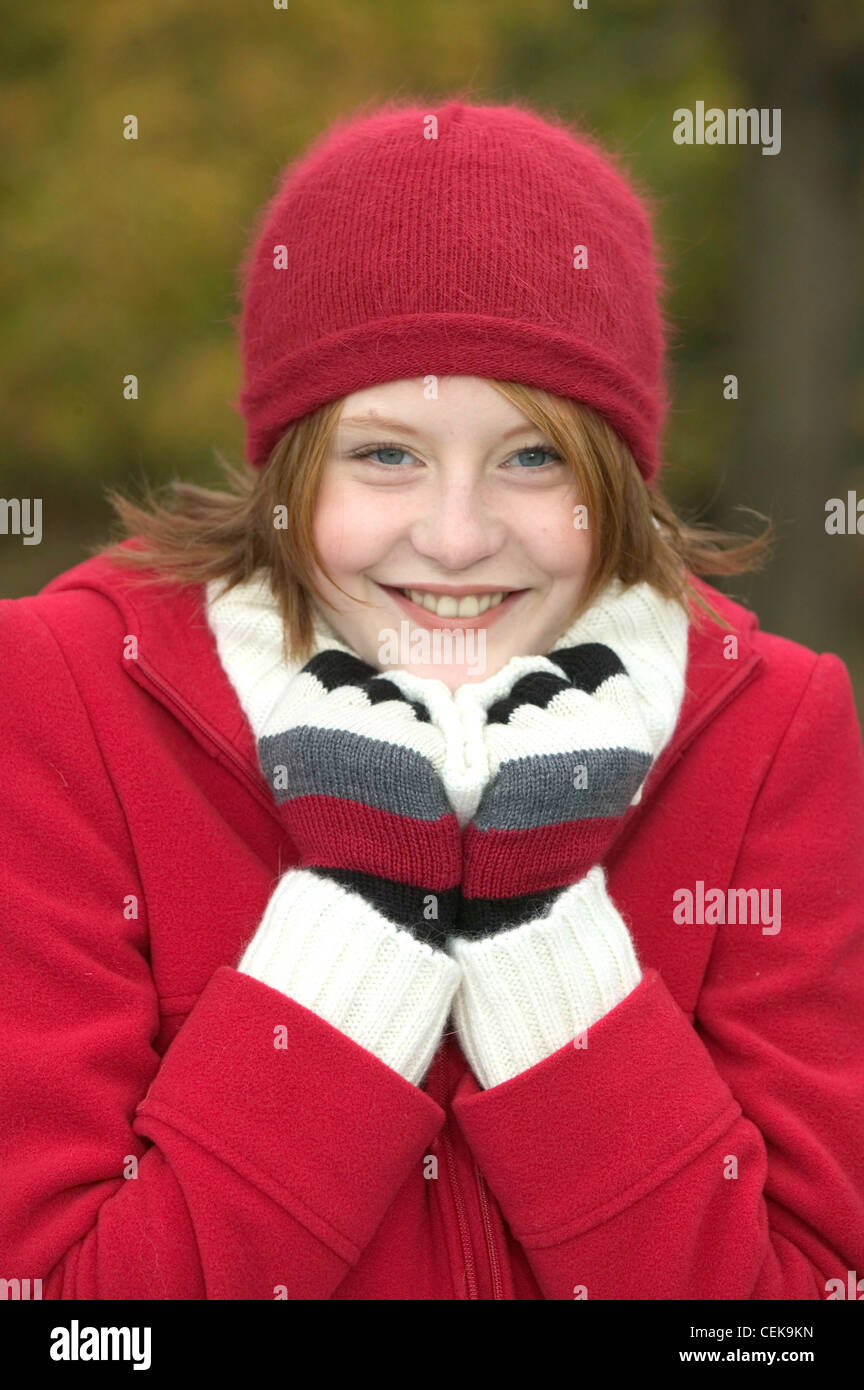 Female Shoulder Length Red Hair Wearing Red Wool Hat White Wool