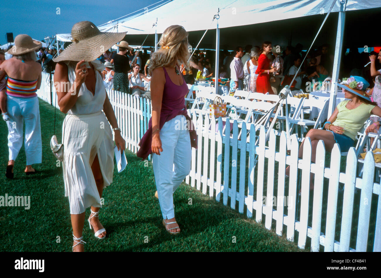 East Hampton, NY, USA, Polo Match, Rich Woman Walking in Fancy Hats