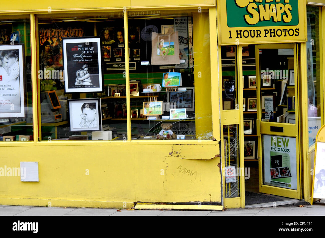 Snappy Snaps' damaged facade Site of the Michael car crash Stock