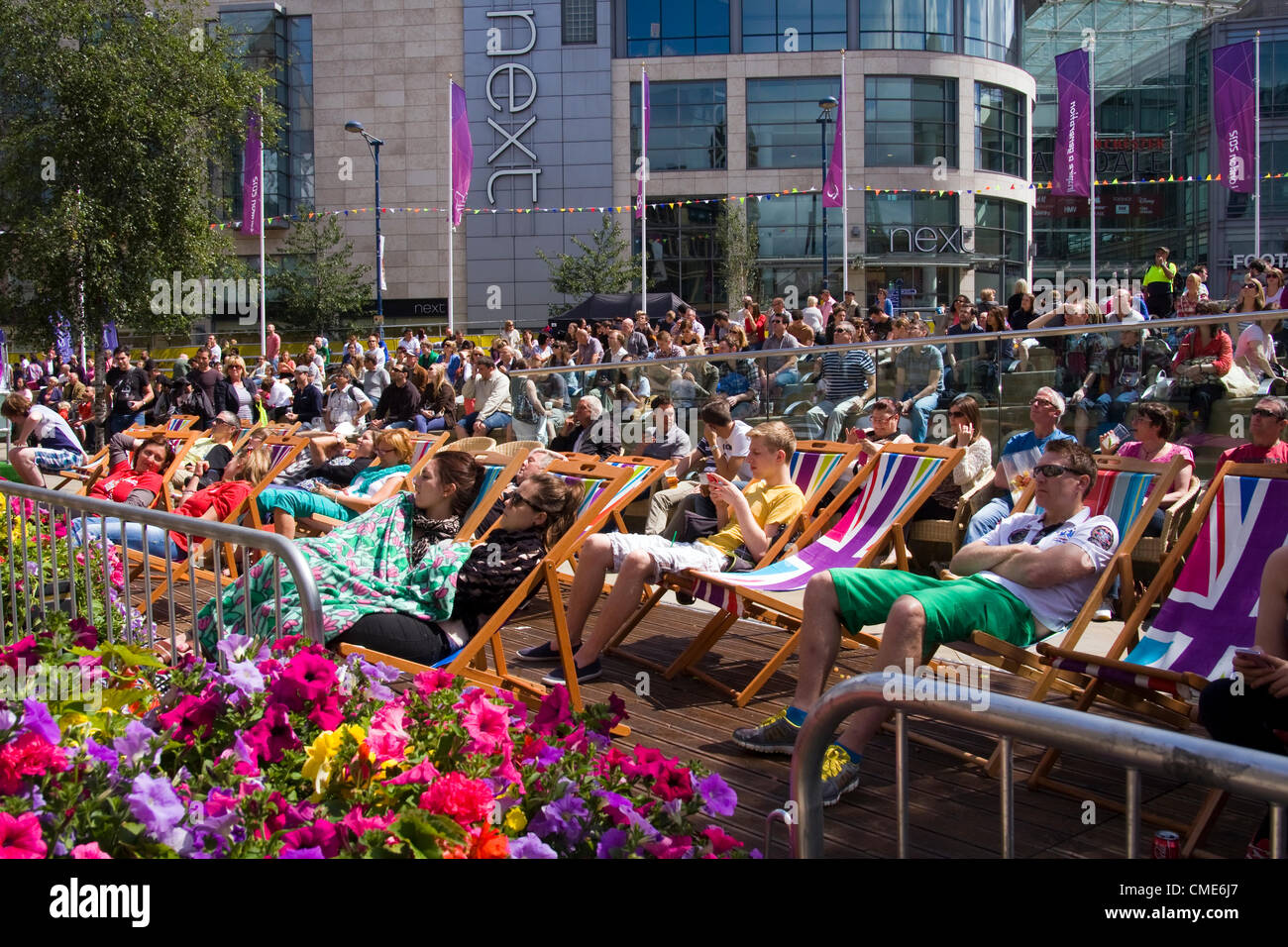 people watching olympics at manchester live site stock people watching olympics at manchester live site stock