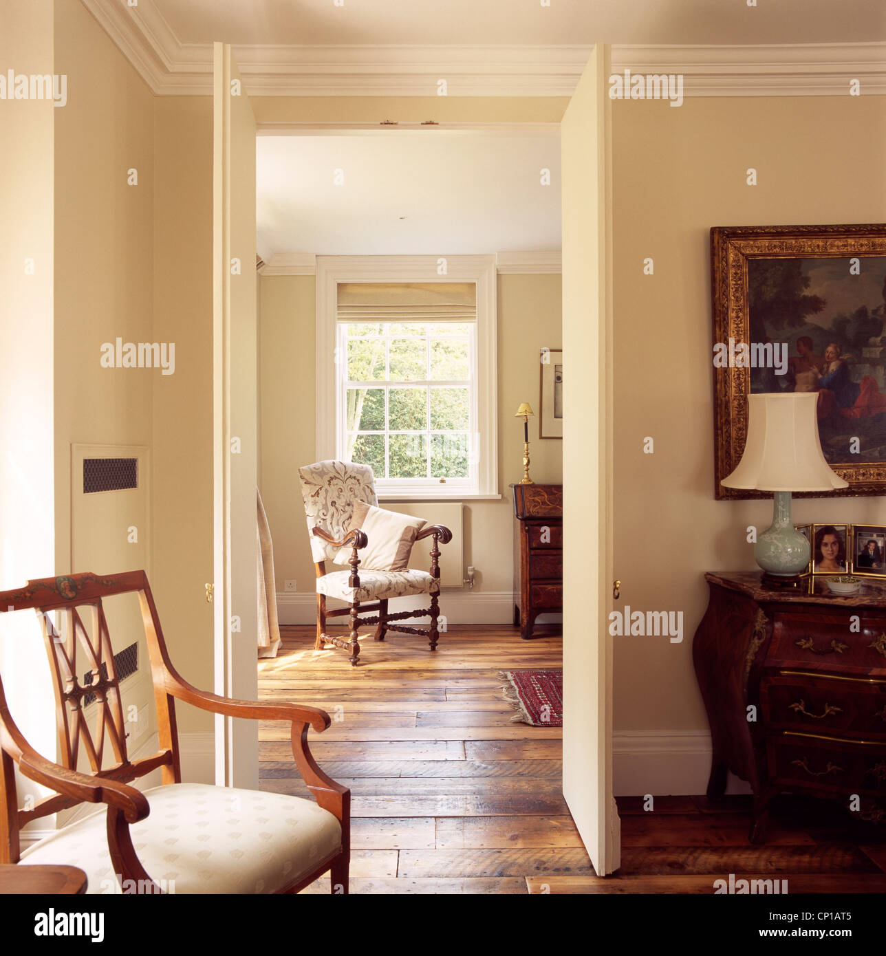 view through open door of traditional drawing room interior, uk view through open door of traditional drawing room interior, uk