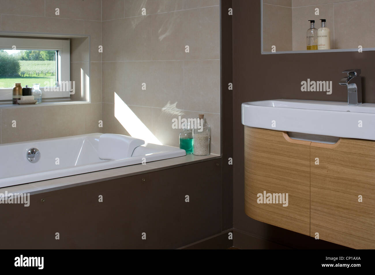 Bathroom Sinks Kent dark brown bathroom with recessed bathtub in carbon neutral home Bathroom Sinks Kent dark brown bathroom with recessed bathtub in carbon neutral home