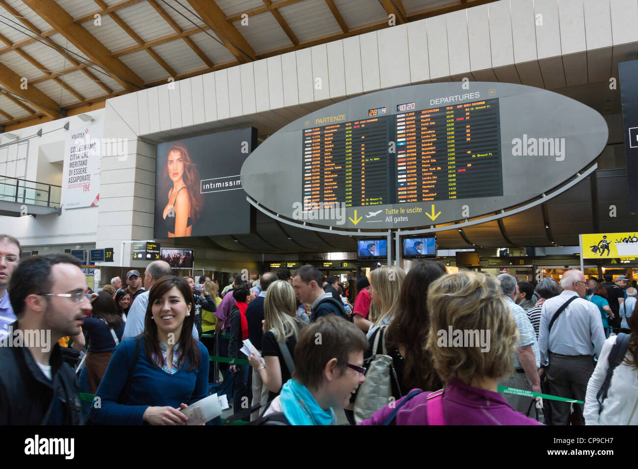 Venice Marco Polo Airport departure gates and advertising with Stock