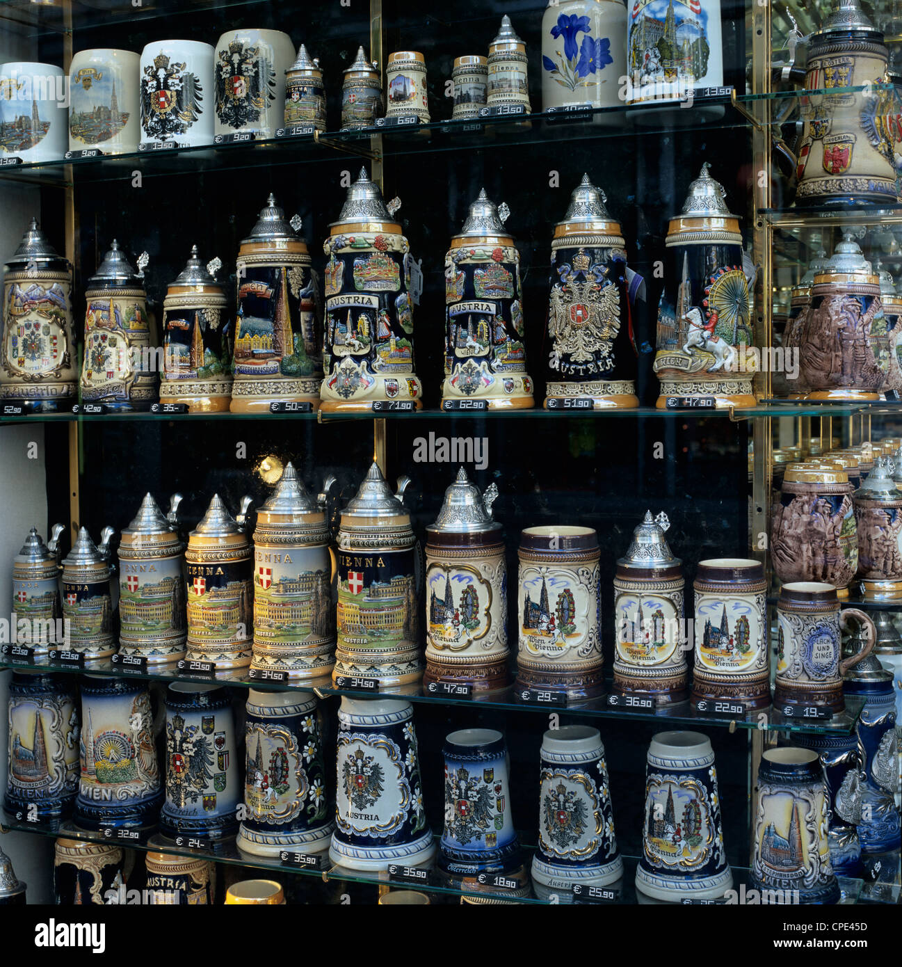 Souvenir shopwindow displaying traditional Austrian beer tankards