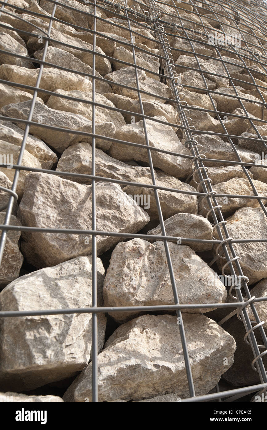 Caged rock riprap in stainless steel frames used as a structural Stock