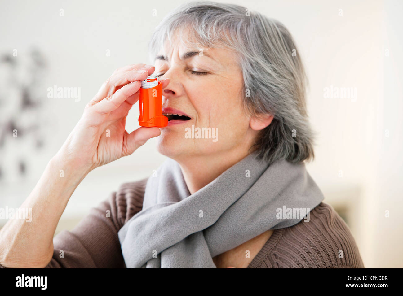 ASTHMA TREATMENT, ELDERLY PERSON Stock Photo, Royalty Free Image