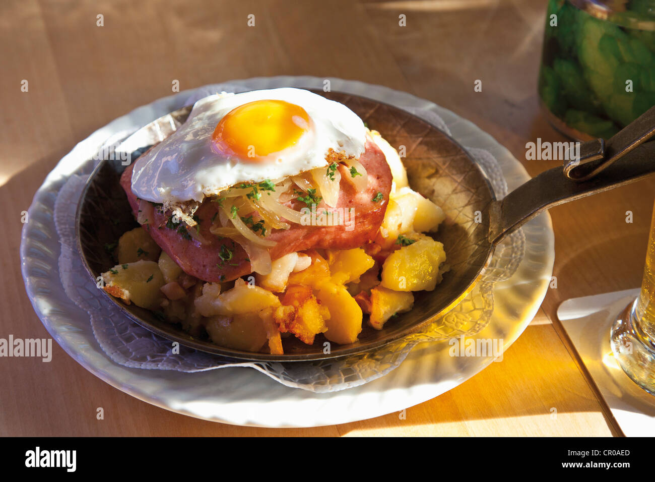 Ina Meatloaf meatloaf, fried egg and roasted potatoes in a pan stock photo Ina Meatloaf meatloaf, fried egg and roasted potatoes in a pan stock photo