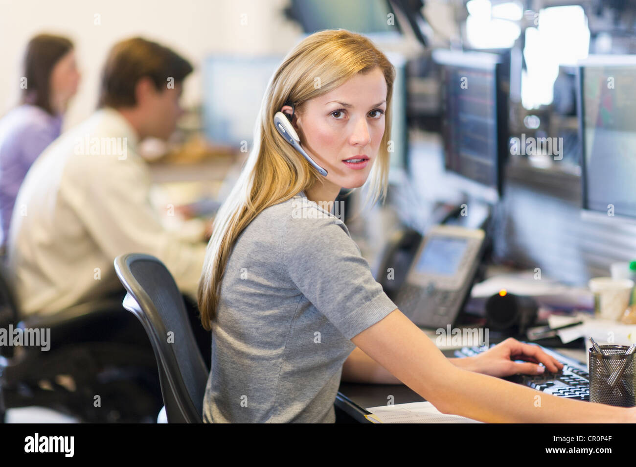 USA, New York, New York City, Portrait of female trader at ...