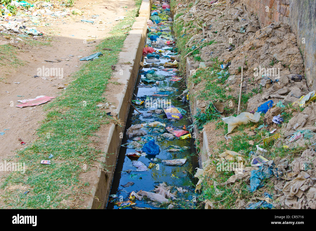 Sewage water polluted by plastic bags Stock Photo, Royalty Free Image