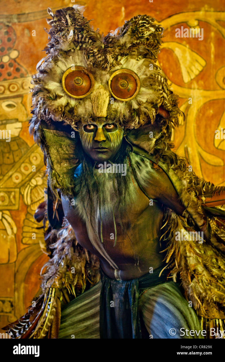 A Maya Dancer/Actor Buho (Owl) in costume performing a Mayan Ritual ...