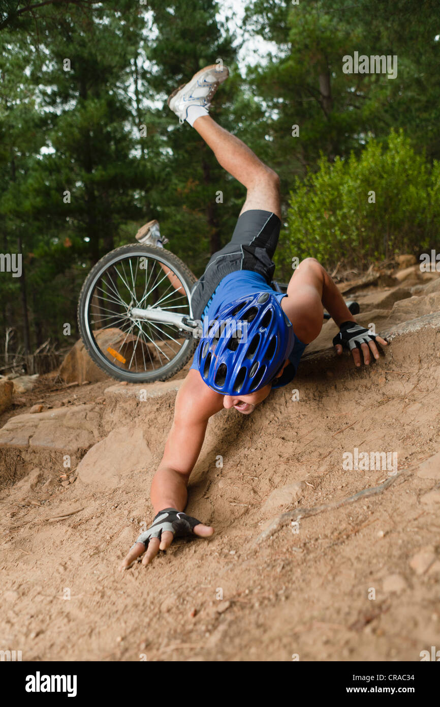 Man falling off mountain bike Stock Photo, Royalty Free
