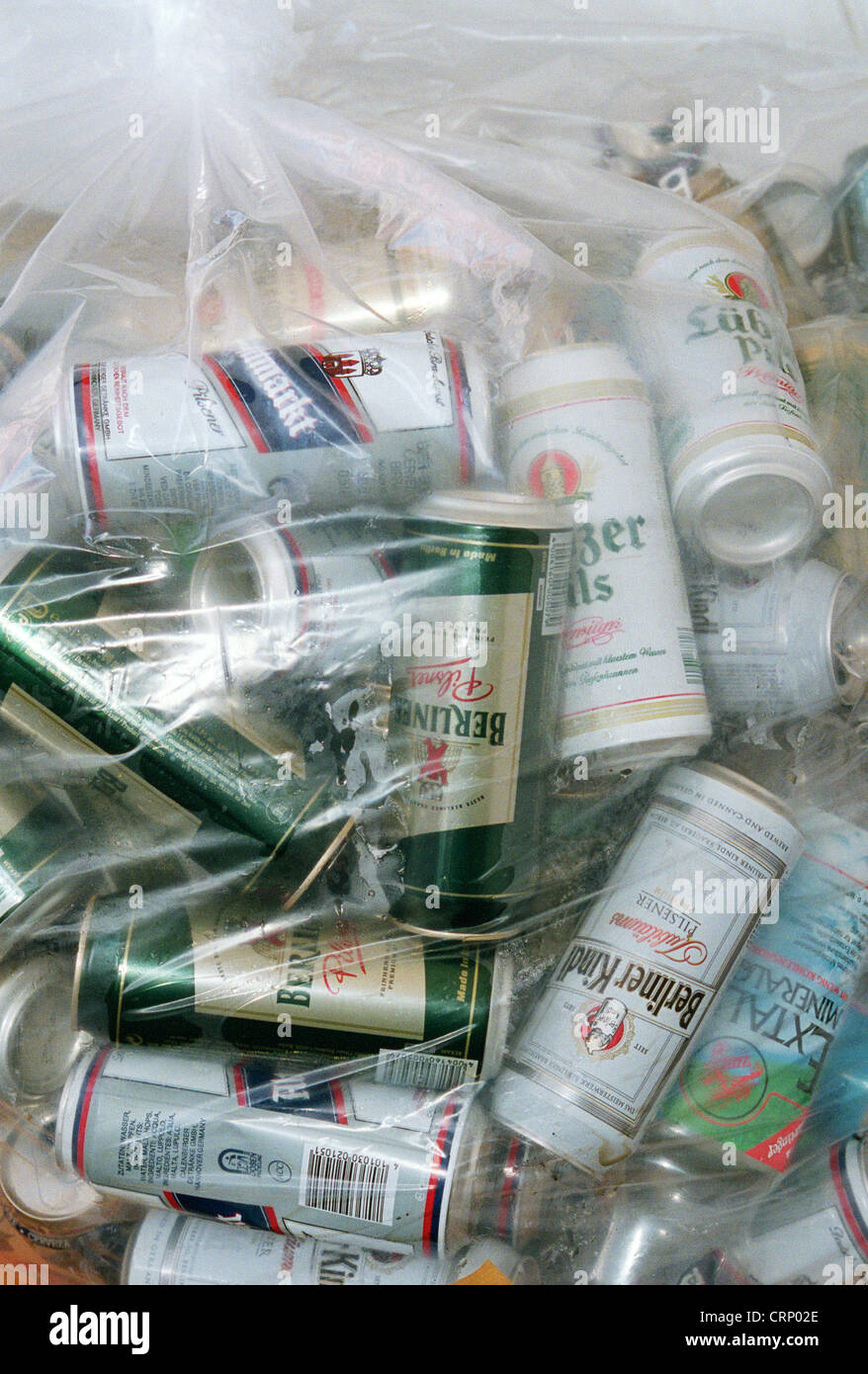 Collection bag full of a supermarket with empty beer cans Stock Photo