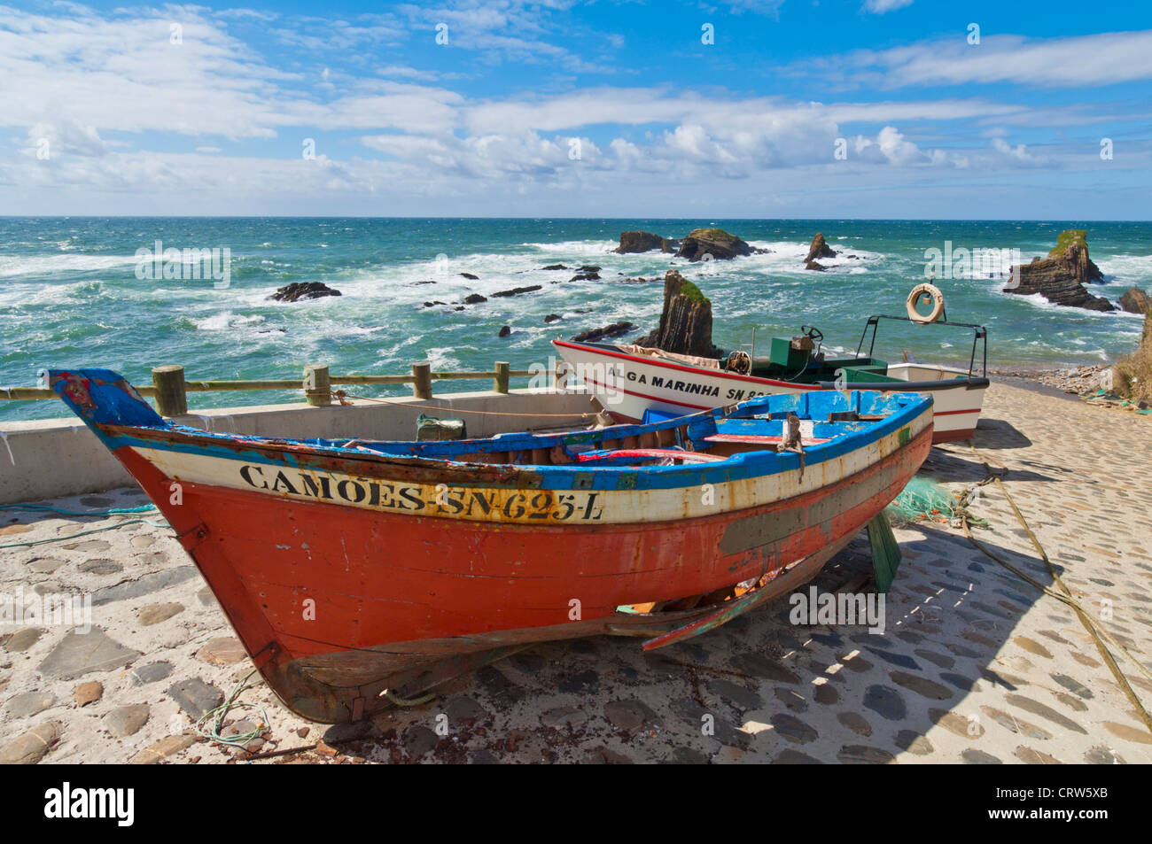 Traditional Painted Portuguese Fishing Boat On Jetty Lapa Da Pombas