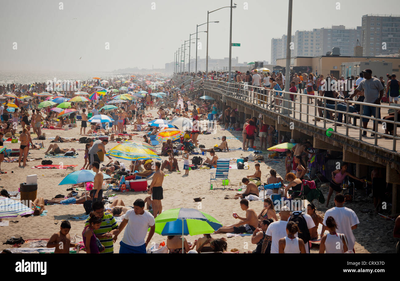 Beachgoers escape the heat wave at Rockaway Beach in the Queens Stock