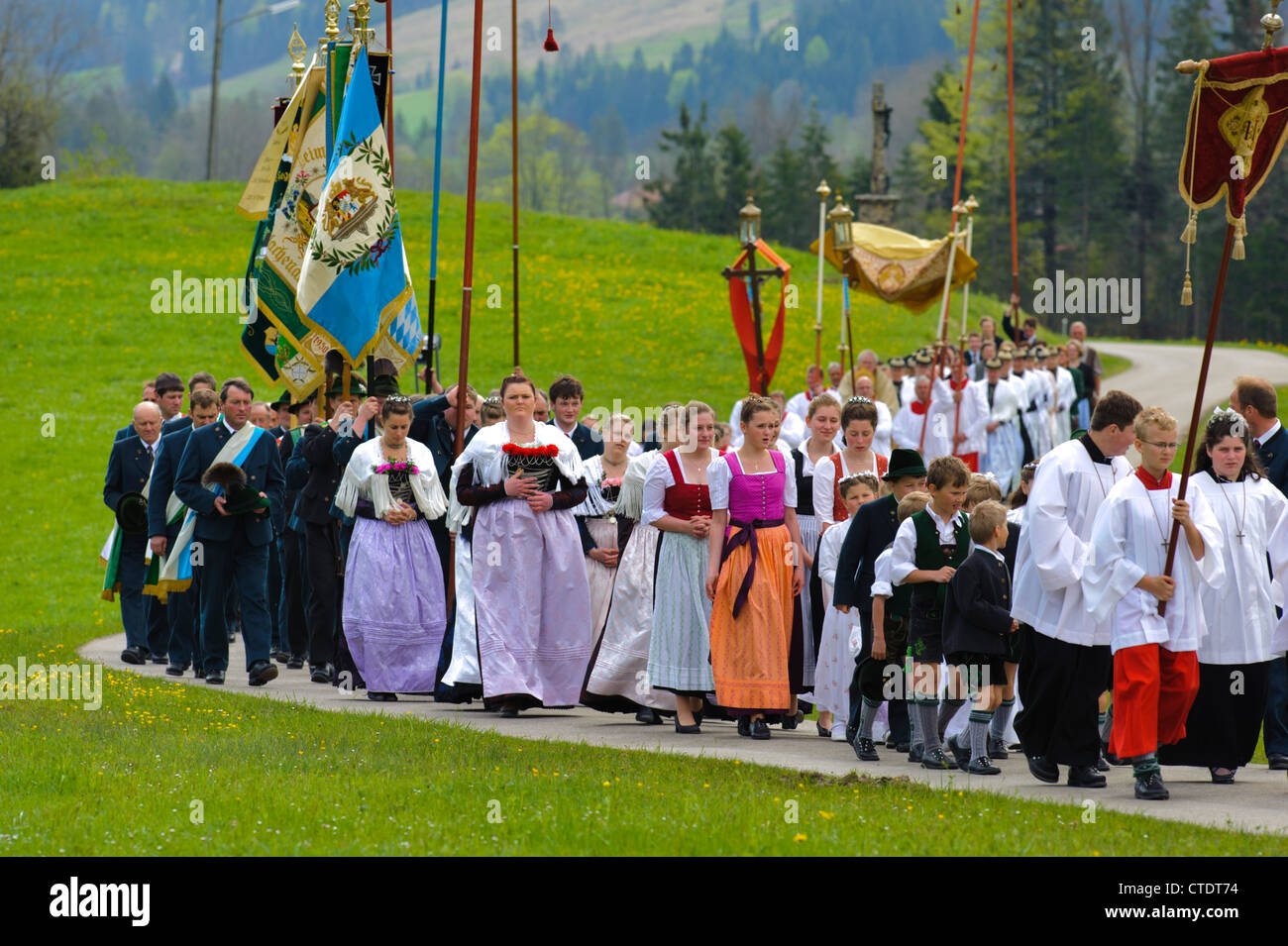 traditional-and-catholic-procession-in-bavaria-germany-in-village-CTDT74.jpg