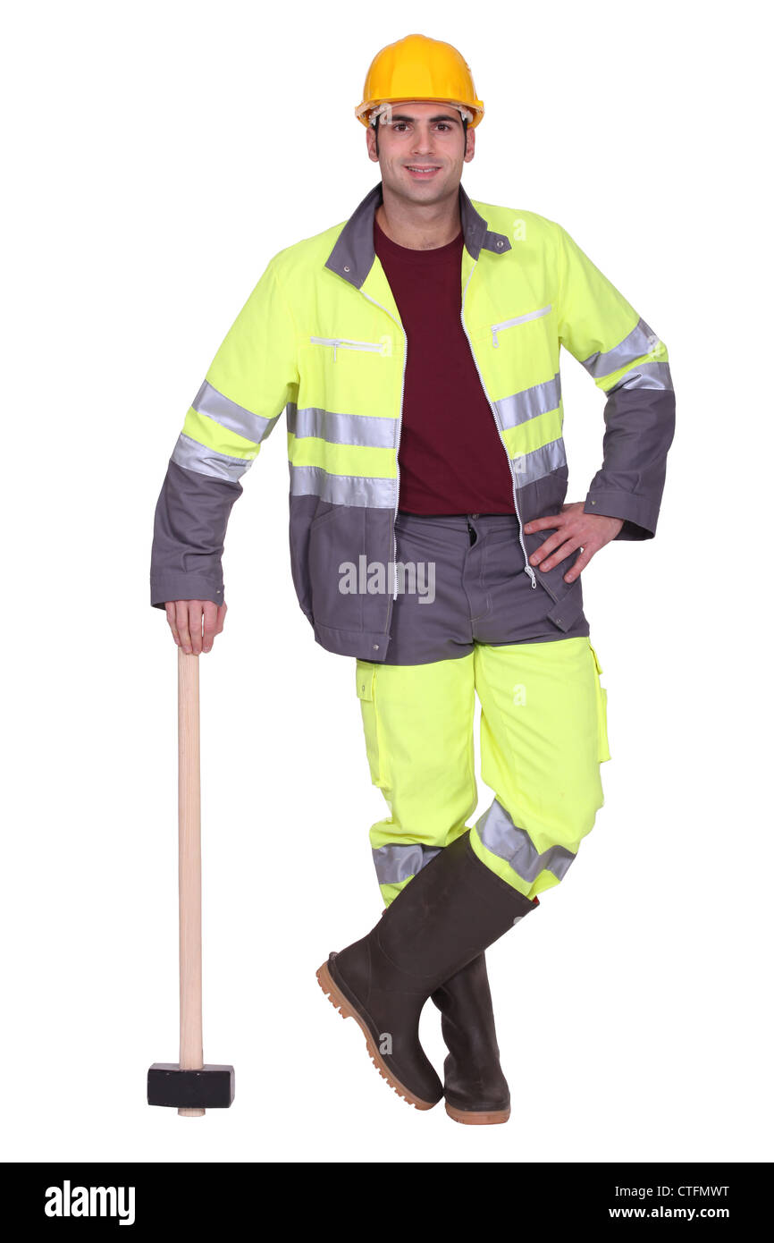 Builder Posing With Sledge Hammer Stock Photo Alamy