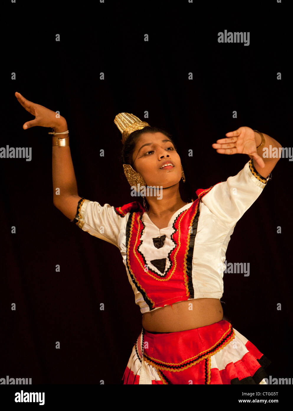 Kandyan girl dancer performing in Kandy, Sri Lanka Stock Photo, Royalty