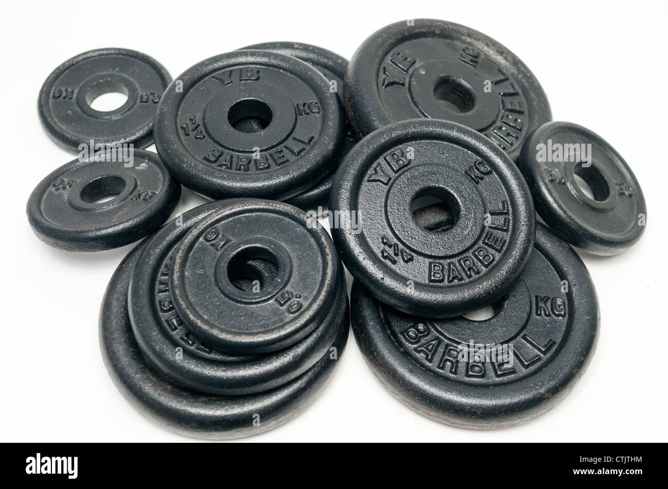 Pile of dumbbell weight discs Stock Photo, Royalty Free Image 49586928