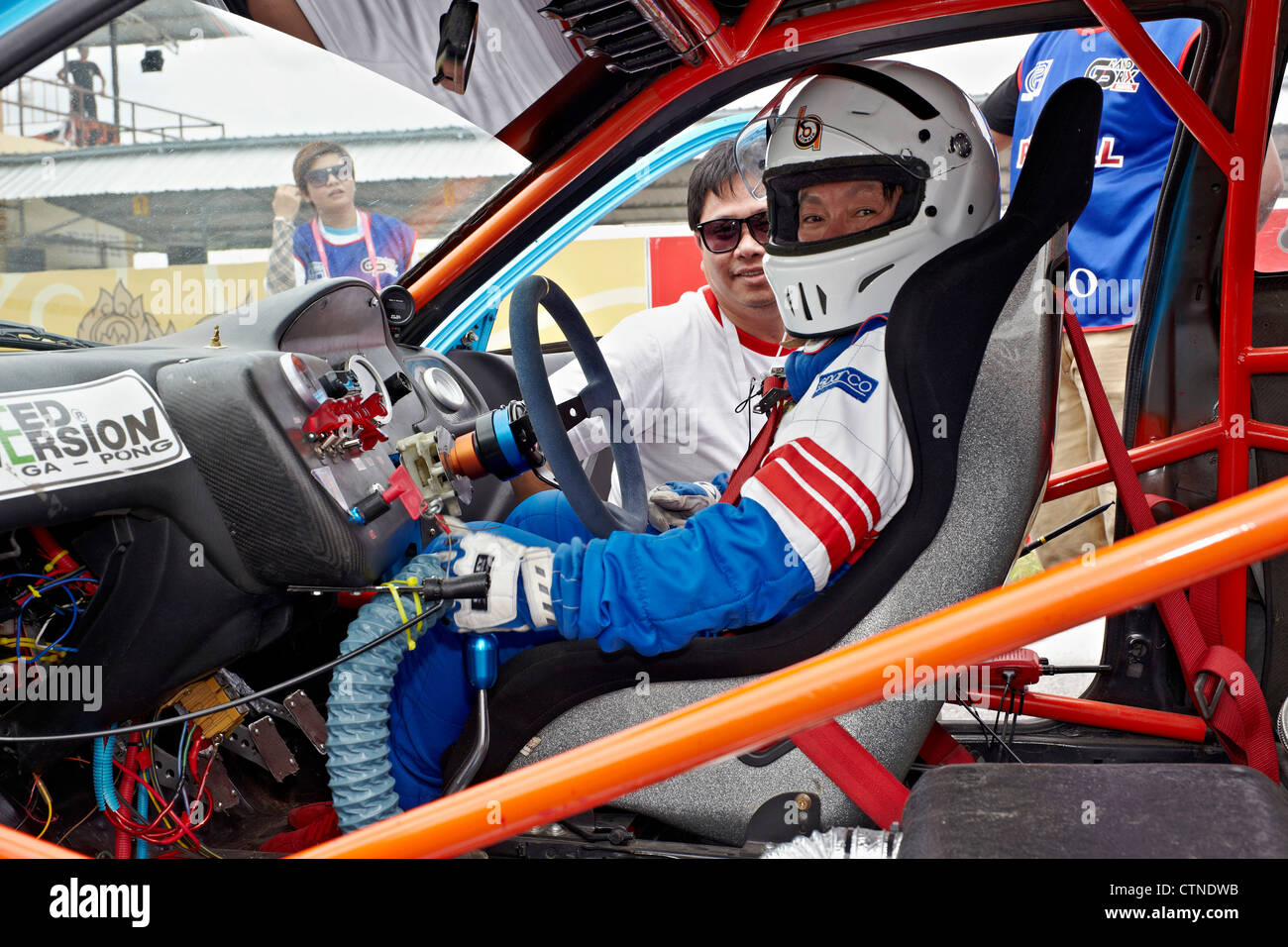 Interior view of driver and safety equipment in a motor racing Stock