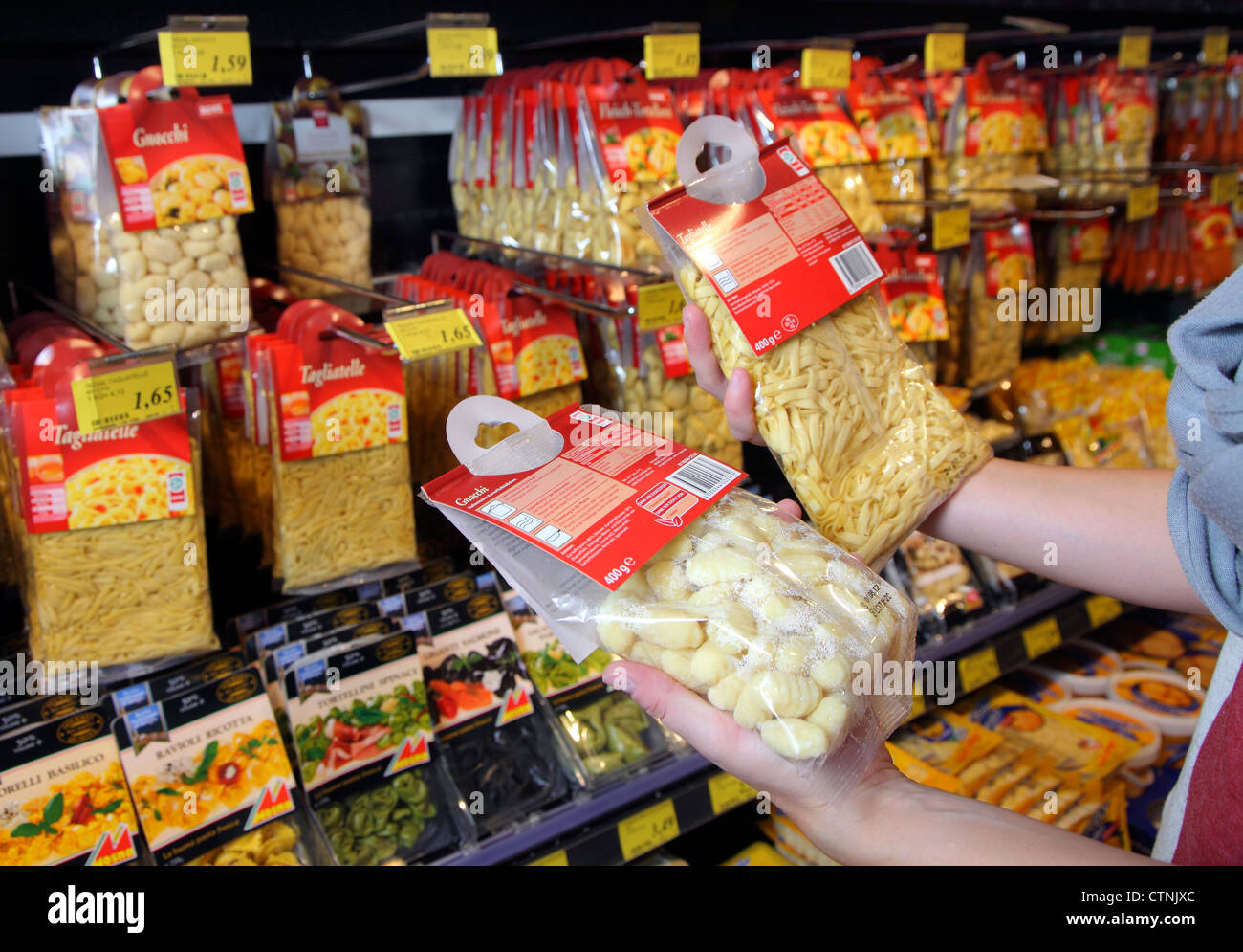 Shopping in a large supermarket. Different products. Fresh pasta Stock