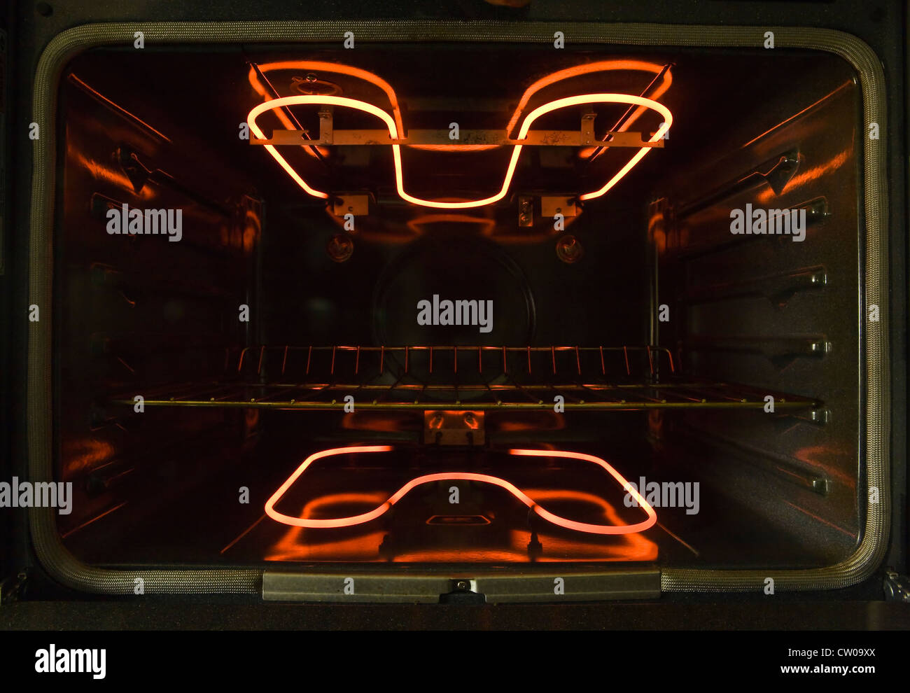 Inside of a convection electric oven showing heating coils and Stock