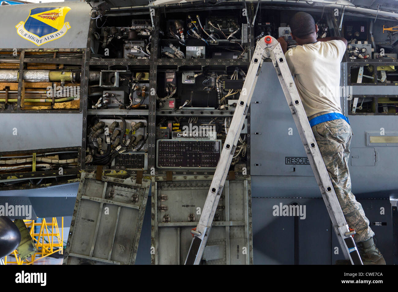 Airmen perform maintenance work on an A-10 Thunderbolt from the 354th