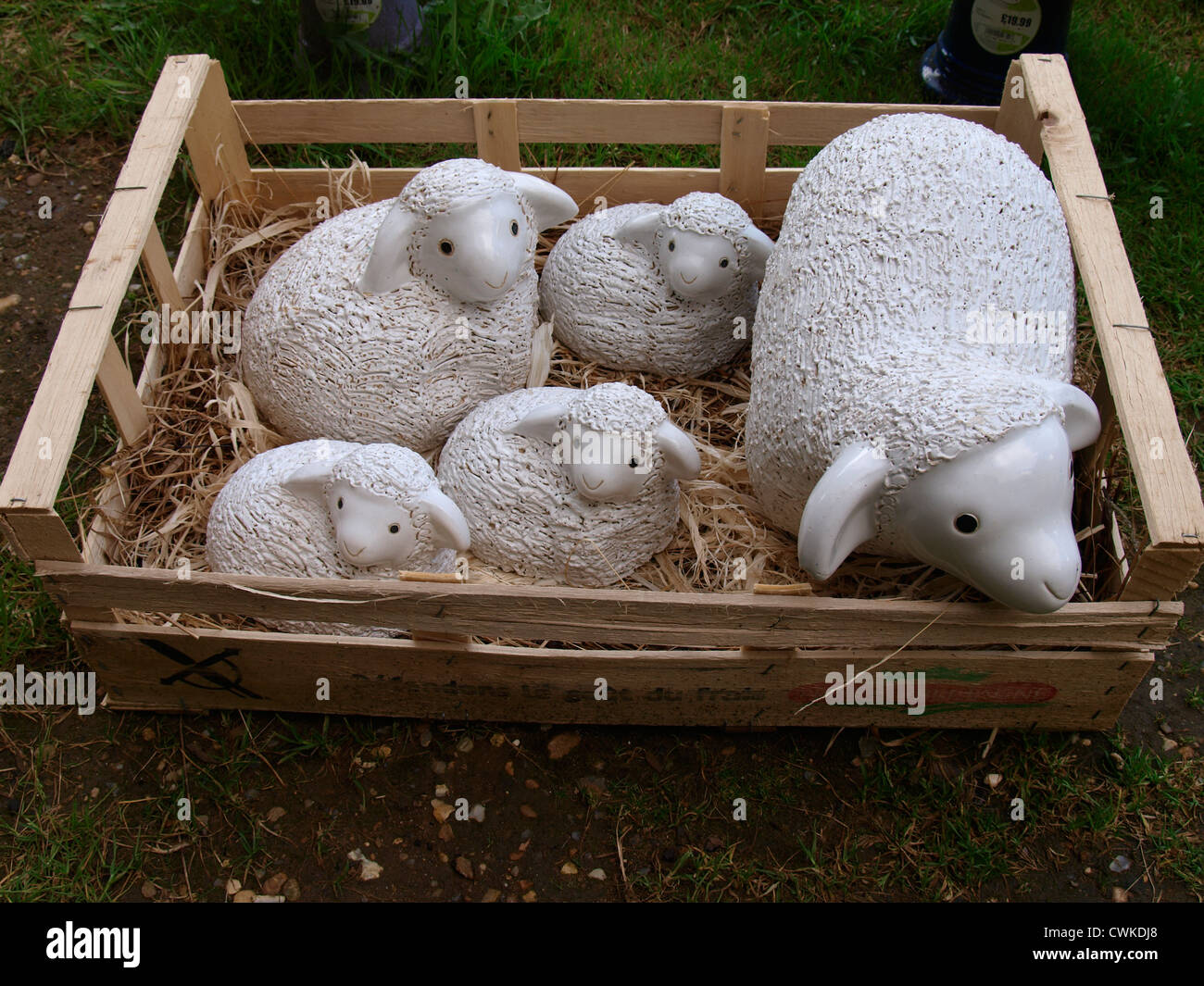 lamb and sheep garden ornaments in a box uk stock photo lamb and sheep garden ornaments in a box uk stock photo