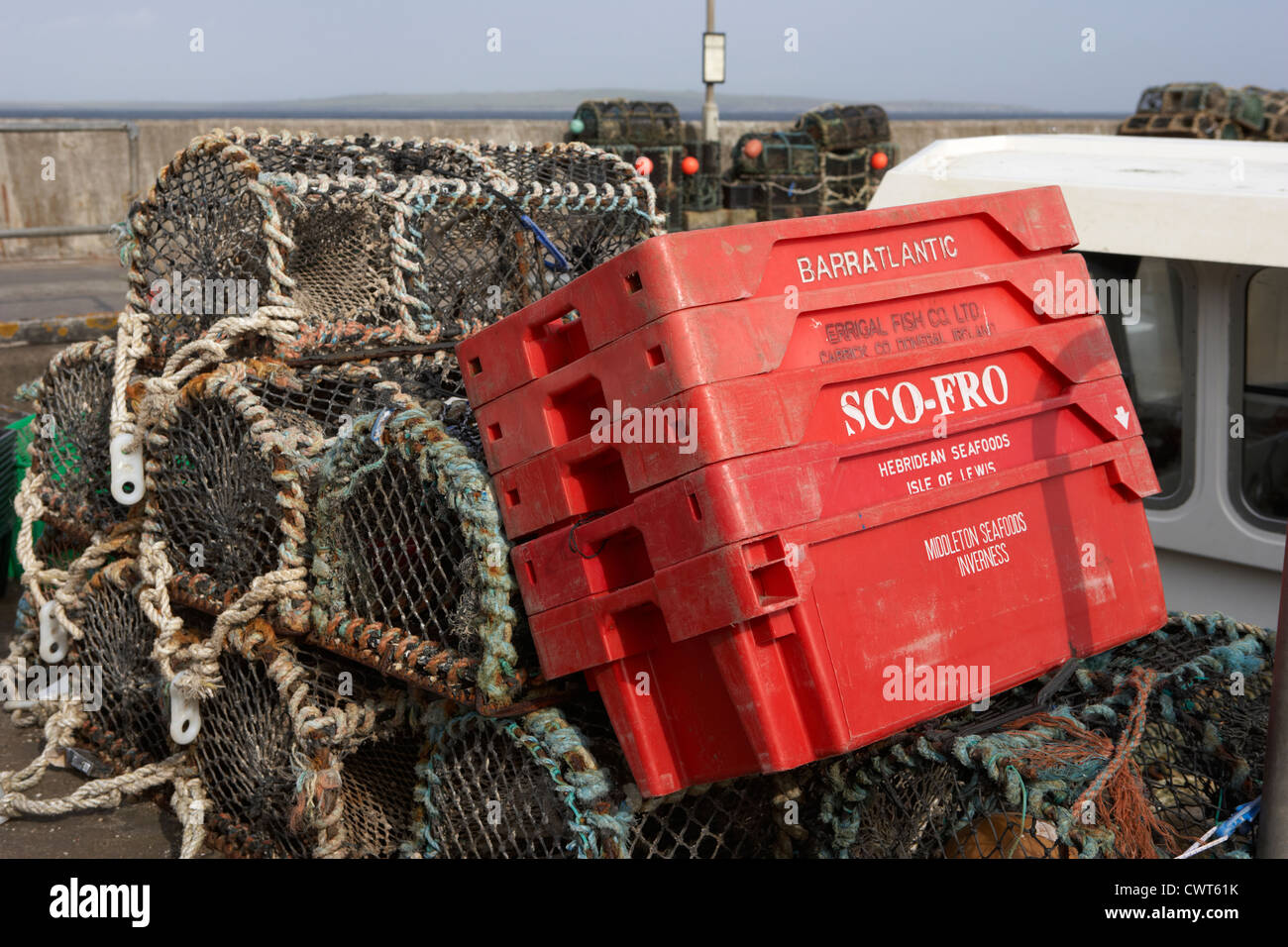 old lobster pots and fish crates piled up at John O’Groats harbour