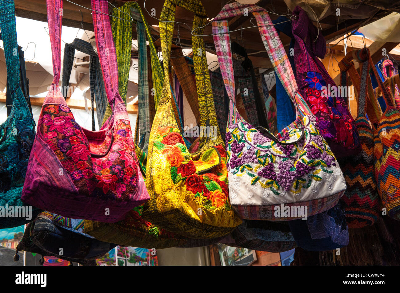 Cloth bags souvenirs at El Carmen artisan market Antigua, Guatemala