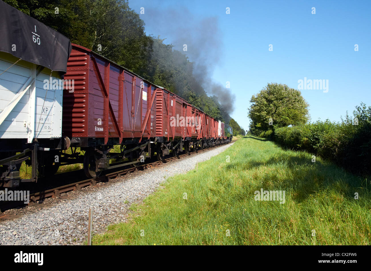 Old fashioned goods (freight) train common UK until the early 1960's Stock Photo, Royalty Free