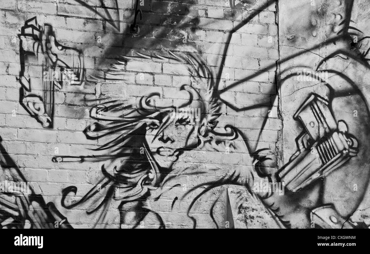 Urban graffiti drawing illustration of girl with guns on brick wall