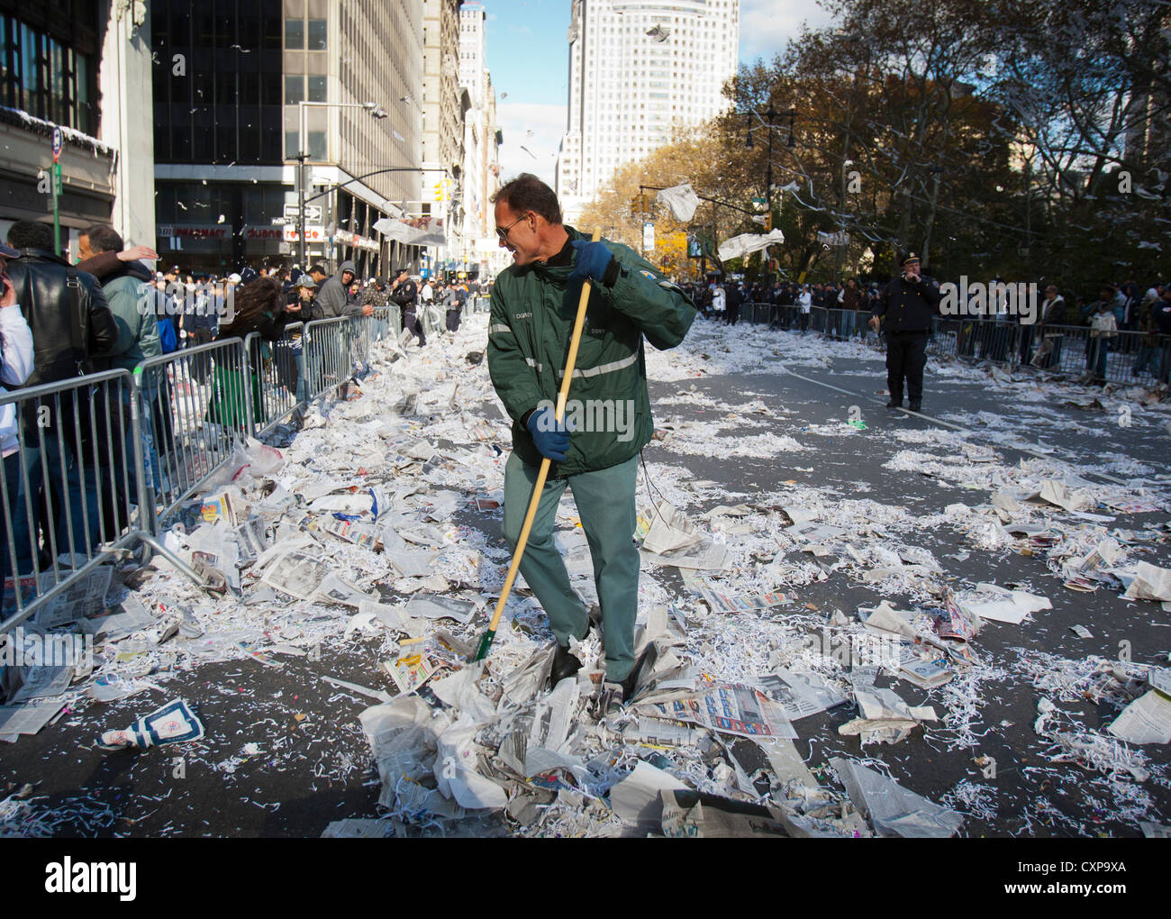 Sanitation workers cleaning up after a ticker tape parade in New York