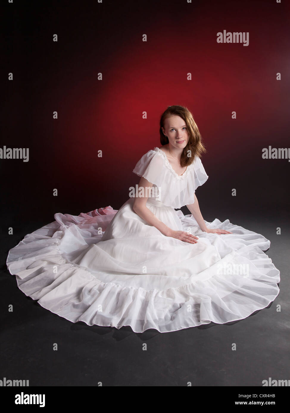 Woman Sitting in Dress
